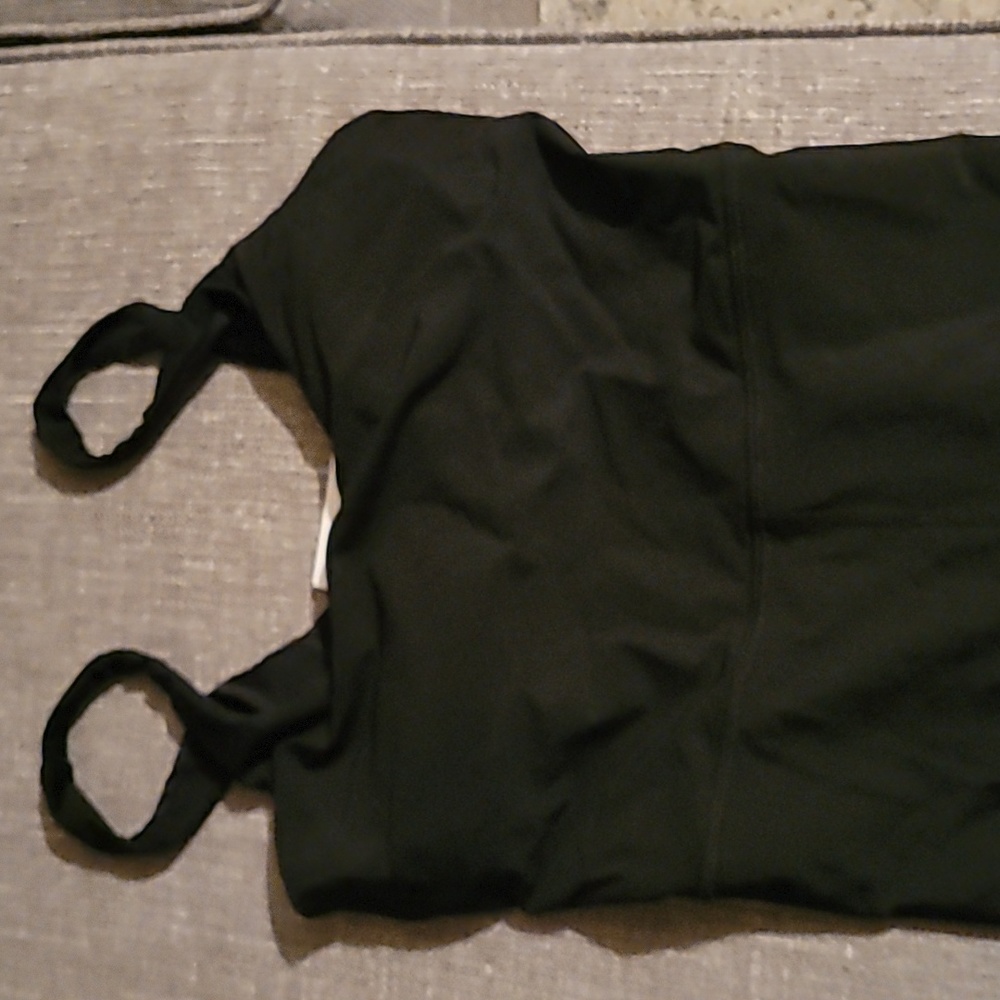 A one-piece set. Brand new with tags.